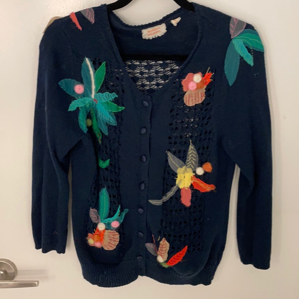 Crocheted cardigan with textured pops of color
